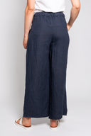 Blue linen wide-leg pants for women featuring a stylish side tie and relaxed fit. Lightweight and breathable, perfect for casual wear, vacations, and summer outfits.