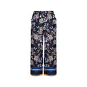 Blue Floral print wide-leg pants for women with an elastic waistband and decorative border hem. Lightweight and breezy, perfect for boho-chic looks, summer outfits, and vacation wear.