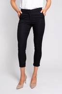 Black slim-fit pants for women with a cropped length, button closure, and rolled cuffs. Stylish and versatile, perfect for casual, office, or smart-casual outfits.