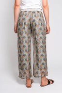 Boho print wide-leg pants for women with a smocked elastic waistband. Lightweight and flowy, perfect for casual wear, beach days, or vacation outfits.