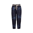 blue tie-dye linen pants for women with a relaxed fit, cropped length, and a decorative belt. Stylish and breathable, perfect for casual wear and boho-inspired outfits.