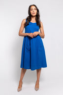 Blue sleeveless midi dress for women with a relaxed fit and front pockets. Lightweight and comfortable, perfect for casual wear, summer outings, and everyday style.