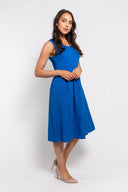 Blue sleeveless midi dress for women with a relaxed fit and front pockets. Lightweight and comfortable, perfect for casual wear, summer outings, and everyday style.