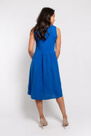 Blue sleeveless midi dress for women with a relaxed fit and front pockets. Lightweight and comfortable, perfect for casual wear, summer outings, and everyday style.