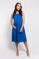 Blue sleeveless midi dress for women with a relaxed fit and front pockets. Lightweight and comfortable, perfect for casual wear, summer outings, and everyday style.