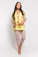 Yellow floral tunic for women with a layered hem, 3/4 sleeves, and a matching lightweight scarf. Perfect for casual wear, spring outfits, and elegant layering.