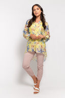 Yellow combo floral chiffon blouse for women with a button-up front, long sleeves, and a flowy high-low hem. Lightweight and elegant, perfect for layering and spring outfits.