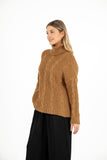 Cable-Knit Tunic Length Sweater With Turtle-Neck Collar